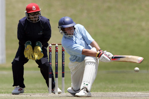 Northerns batsman sweeps the ball to the boundary