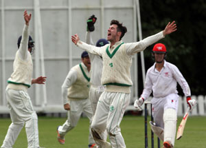 George Dockrell celebrates the wicket of Carter as Ireland beat Hong Kong by 70 runs
