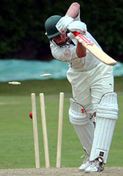 James Morris of MCC is bowled by Alex Cusack in the match against Ireland A at Malahide. 