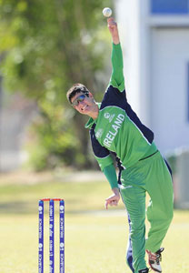 George Dockrell took four wickets as Ireland beat Nepal by 14 runs in Townsville